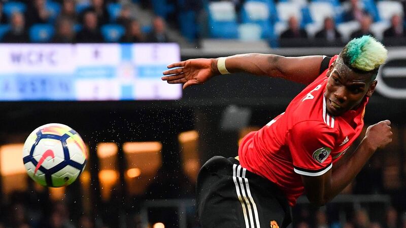 Paul Pogba scores Manchester United’s equaliser in the derby. Photograph: Ben Stansall/AFP