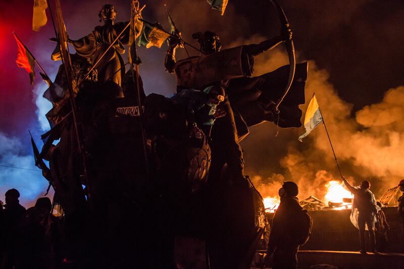 Maidan protesters 10 years ago as violence flared between them and the police: 'There had always been corruption but under Yanukovich it was really terrible.' Photograph: Brendan Hoffman/Getty 