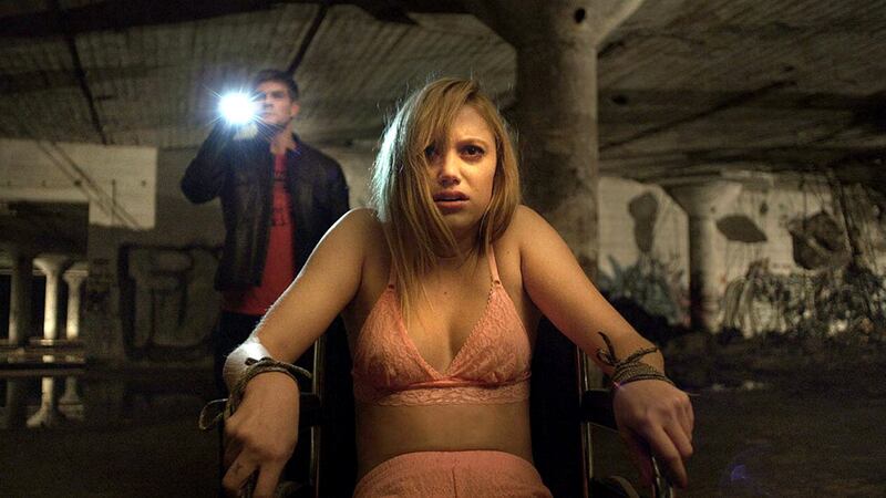 Maika Monroe in David Robert Mitchell’s It Follows: "An unexpectedly beautiful and nostalgic tribute to an era when teenage complications were no less severe, but were simply different in tone"