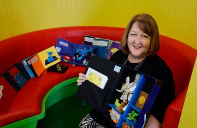 Aideen Brady, library and information officer, with tactile books for teaching pre-Braille skills. Photograph: Alan Betson