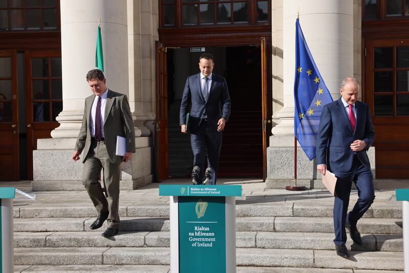 Minister for the Environment, Eamon Ryan, Taoiseach Leo Varadkar and Tánaiste Micheál Martin on the steps of Government Buildings. Photograph: Dara Mac Dónaill







