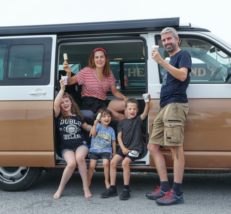 Eva and Ciaran Gahan with their children Clodagh (9), Ultan (3) and Oscar (7) during a stop off in their campervan for ice creams in Connemara. Photograph: Joe O'Shaughnessy