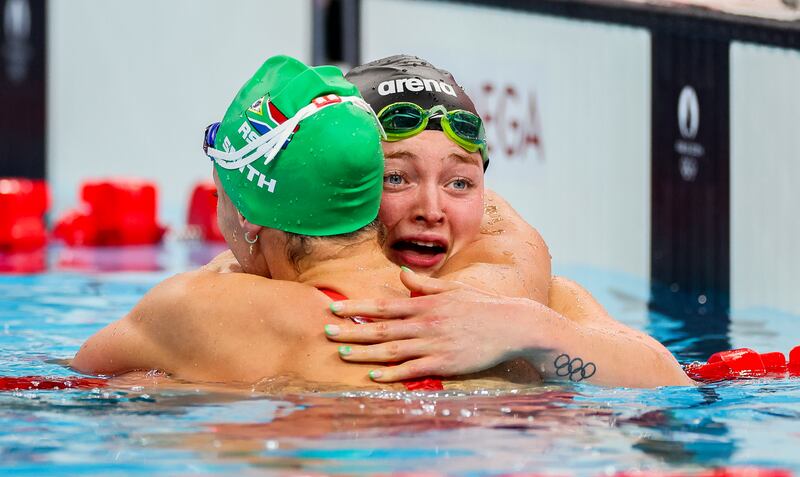 Mona McSharry celebrates winning a bronze medal with gold medal winner Tatjana Smith of South Africa. Photograph: James Crombie/Inpho