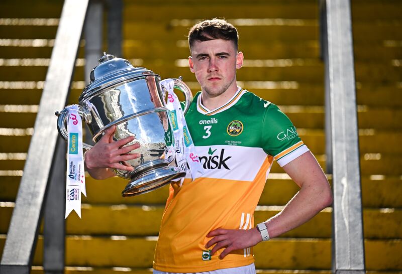 Offaly hurler Ciarán Burke poses for a portrait with the Bob O'Keeffe Cup at the launch of the Leinster championship. Photograph: Sam Barnes/Sportsfile