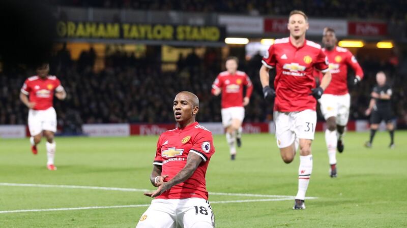 Young celebrates scoring his second goal of the game. Photo: Andrew Matthews/PA