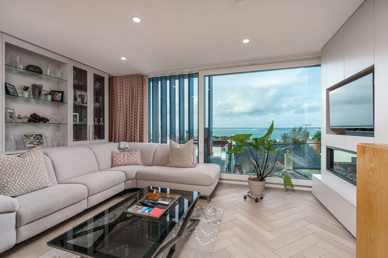 The top floor is an open-plan kitchen, living and dining room