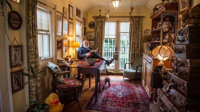 David Norris admits that his charmingly cluttered walls boast 17 painted portraits of him. Photograph: Ruth Medjber