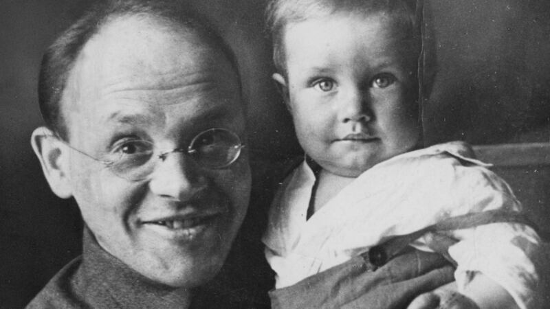 Soviet writer Isaac Babel with his son Emmanuil.  Babel was executed under the regime of Joseph Stalin. Emmanuil Babel’s name was later changed to Mikhail Ivanov. He later became a noted painter. Photograph: Sovfoto/Universal Images Group via Getty