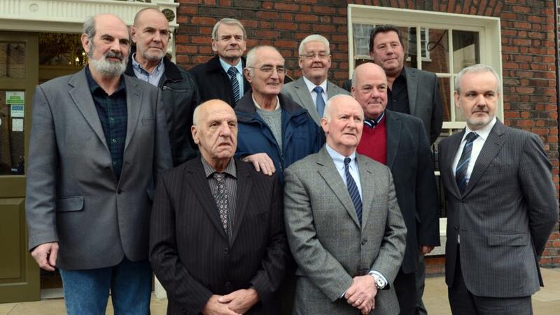 The ‘Hooded Men’ attend an Amnesty Press conference in Dublin last year. From left - Micheal Donnelly, Patrick Mc Nally, Brian Turley, Gerry McKerr, Francis Mc Guigan, Joe Clarke, Jim Auld. Front left - Kevin Hannaway, Liam Shannon and Colm O Gorman of Amnesty Ireland. Photograph: Cyril Byrne/The Irish Times.