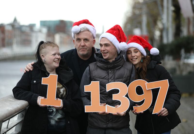 Depaul chief executive David Carroll (at back) with Peter's Place service users  Amy-Lee Joyce (left, 25), Nathan (26) and Jodie Taite (21). Depaul has launched its Urgent Homeless Crisis Christmas Appeal. Photograph: Sasko Lazarov/Photocall Ireland
