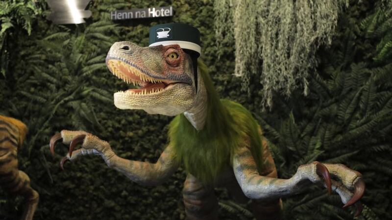 Robot-run hotel: the Henn-na’s dinosaur receptionist. Photograph: Kiyoshi Ota/Bloomberg