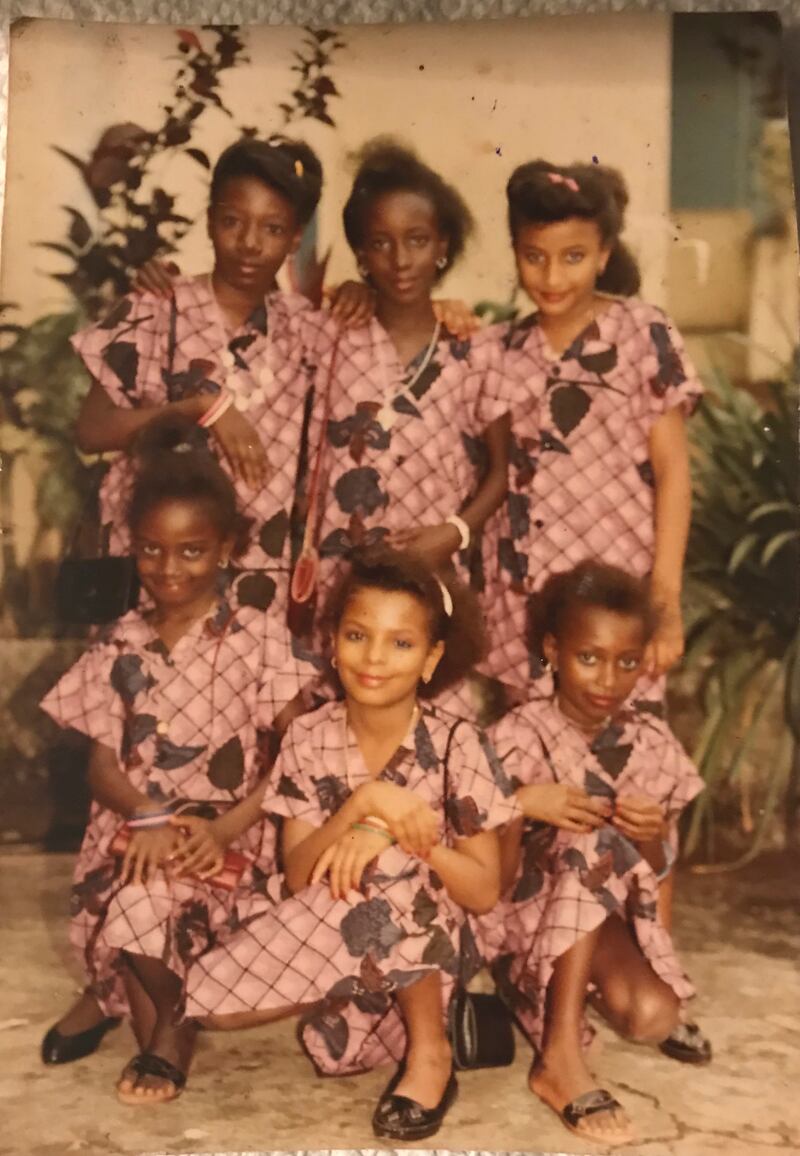 Saffiatu Sillah (7), centre front, in Sierra Leone, a few weeks after she was circumcised.