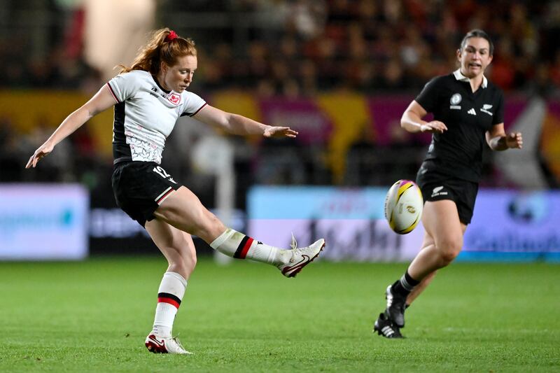 Alex Tessier of Canada kicks the ball clear upfield. Photograph: Dan Mullan/Getty
