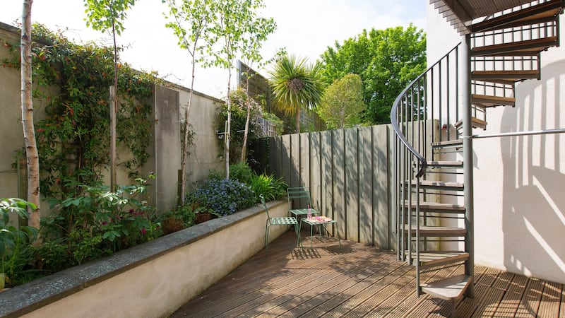 The decked rear patio area