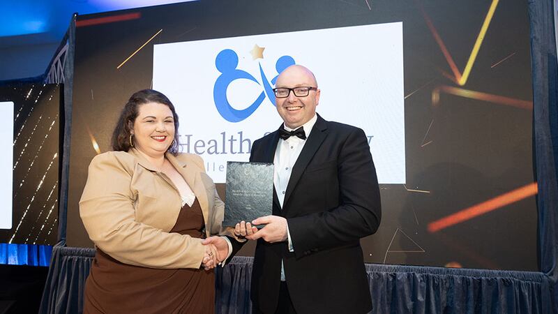 Jennifer Lee, awards judge, presents the health & safety excellence award – food & beverage to Tom Crosbie, Tirlán