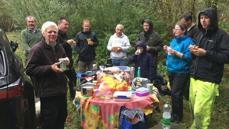 Residents from a direct provision centre and local residents form a working group to clear foliage in Abbeyleix