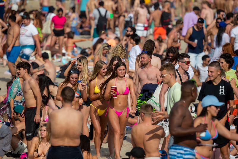 Beachgoers enjoy the sun at Burrow Beach in Sutton, Co Dublin.