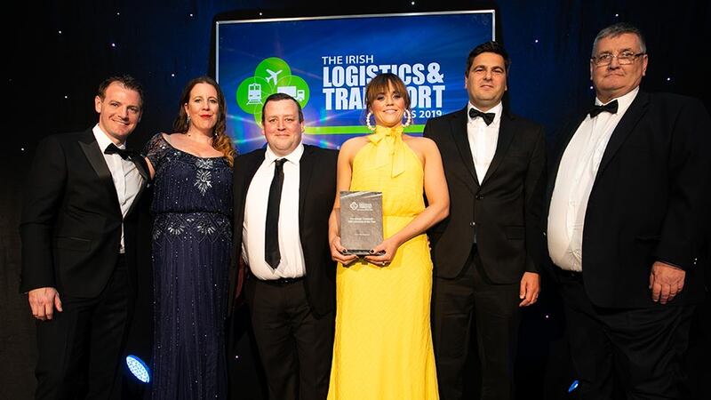 Ailbe Burke, Awards Judge presents the Passenger Transport Company of the Year award to Dave Rooney & David Horgan, Transdev Dublin Light Rail.
