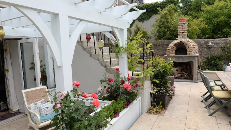 The Bradburys installed a pizza oven and grill area on the patio. Photograph: Dara Mac Dónaill