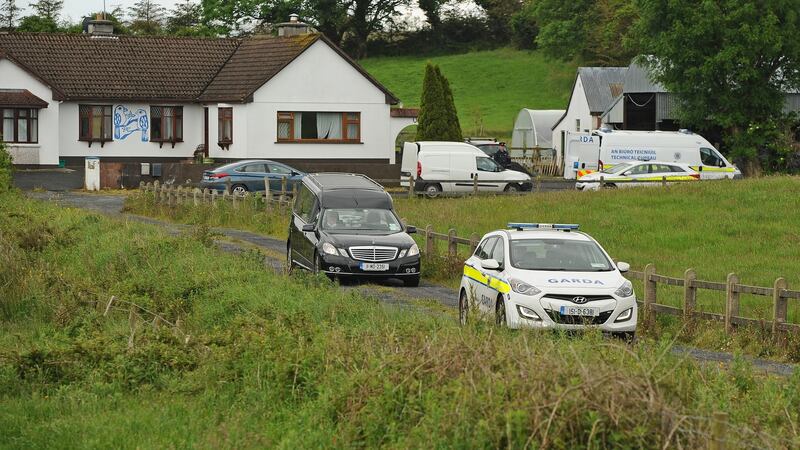 The remains of Valerie Kilroy are removed from her Mayo home by an undertaker on Saturday. Photograph: Conor McKeown