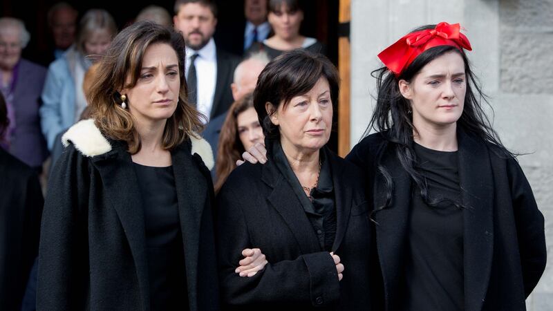 Pat Geraghty’s wife, Kathy Sheridan, and their daughters Sarah and Mary-Kate at Pat’s funeral. Photograph: Tom Honan