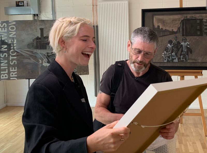Jessie Buckley with artist Pat Curran at the Matt Talbot Community Trust. Photograph: Pauline McNamara/RTÉ