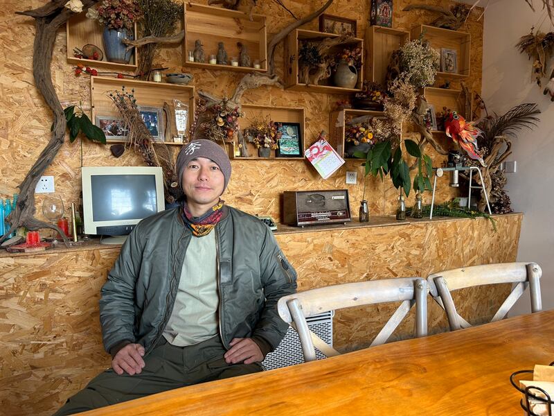 Li Yan in his restaurant, Bistro and Bowl, in Dali: 'They say Dali is a place that can comfort any type of soul.' Photograph: Denis Staunton