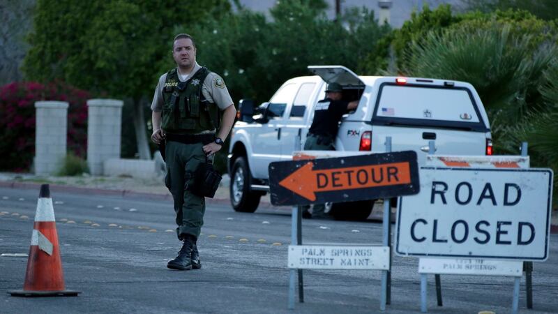 A police officer on the scene of a shooting in Palm Springs, California on Saturday in which two police officers were killed. Photograph: EPA