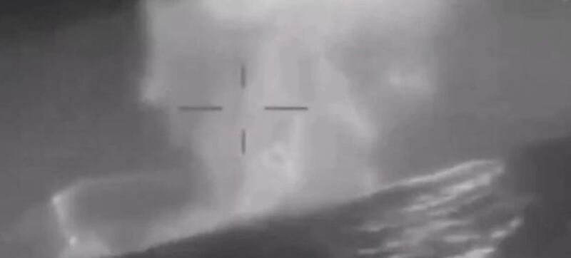 An image taken from a video released by Ukrainian military intelligence appears to show a drone striking a Russian ship off the Crimea coast. Image: X/Ukraine military intelligence