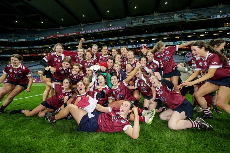 The Dicksboro team celebrate with the trophy following their All-Ireland camogie club final victory over Sarsfields at Croke Park. Photograph: Laszlo Geczo/Inpho 