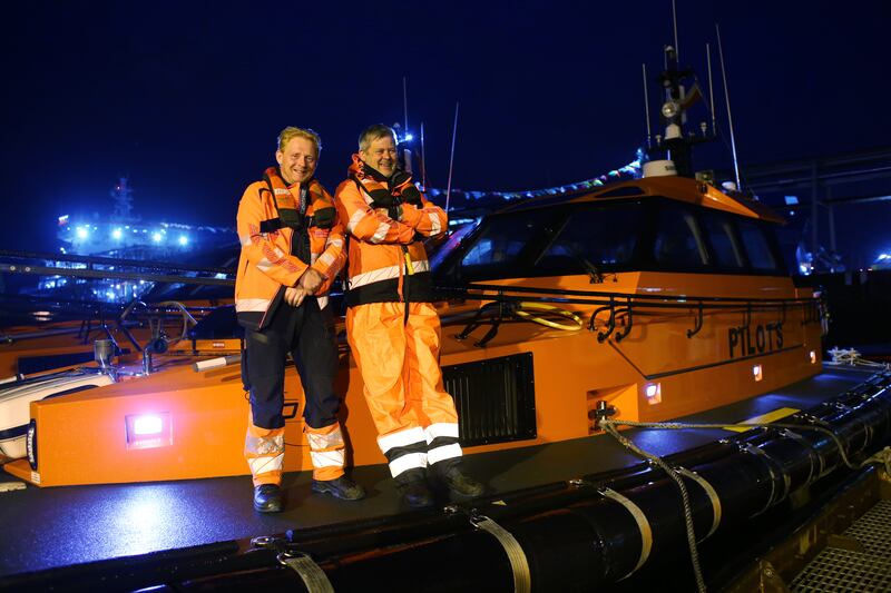 Marine operatives Andrew Markey (left) and Sean Flanagan on a Dublin Port pilot vessel. Photograph: Bryan O'Brien