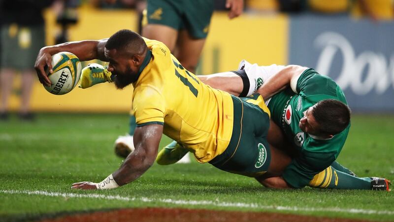 Johnny Sexton can’t prevent  Marika Koroibete from scoring in Sydney. Photograph: Matt King/Getty