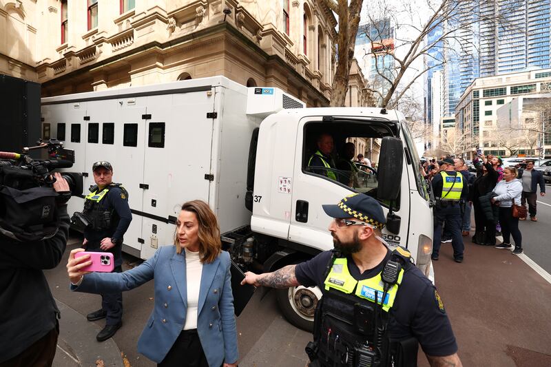 A van carrying Erin Patterson departs the court house following her sentencing at the Supreme Court of Victoria  in Melbourne, Australia. Photograph: Morgan Hancock/Getty Images