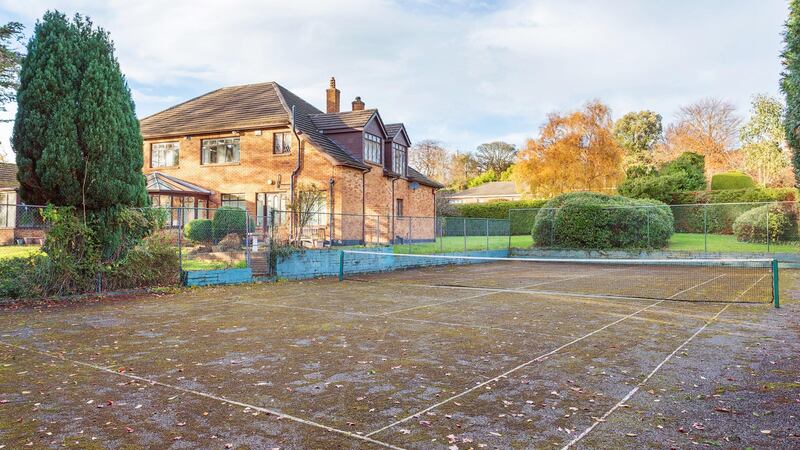 Tennis court at side of the house