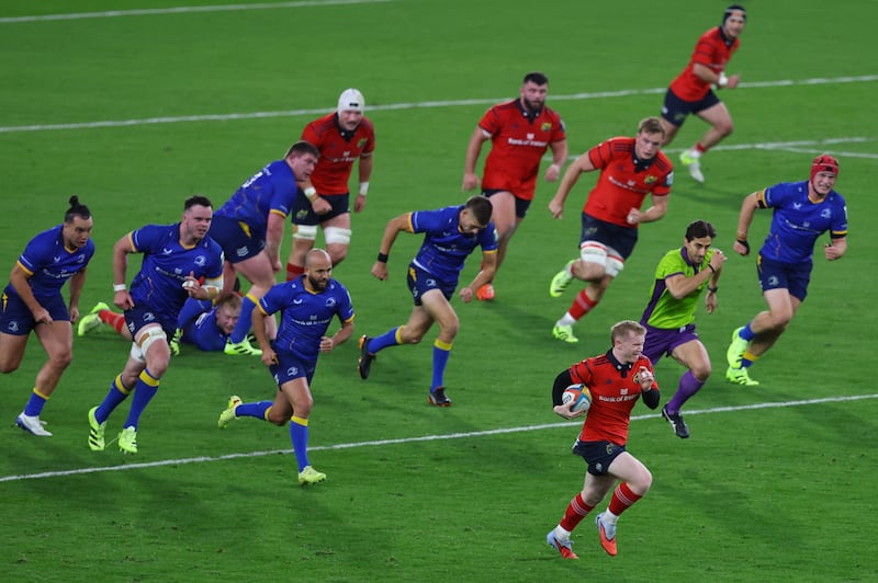 Munster's Ethan Coughlan makes a break on way to scoring his sides third try of the match against Leinster. Photograph: Ben Brady/Inpho