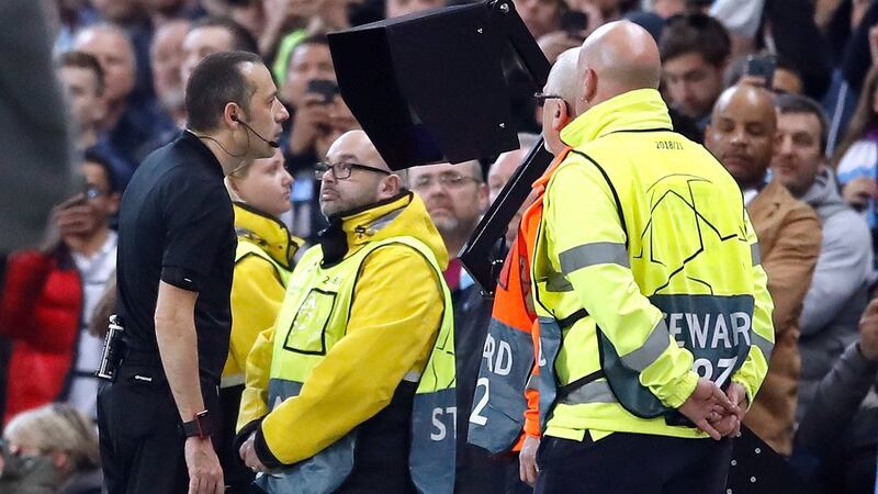 Referee Cüneyt Çakir consults VAR before allowing Fernando Llorente’s goal to stand, putting Tottenham Hotspur back in front on aggregate against Manchester City. Photograph: Martin Rickett/PA Wire