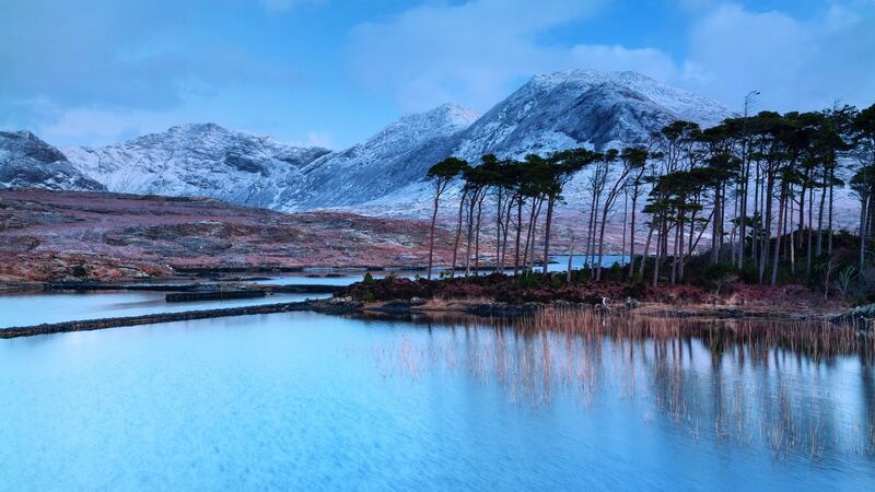 One of the oldest images in the book shows a wintry view of Derryclare Lough in Connemara. It was  the first time I experienced snow in Ireland.