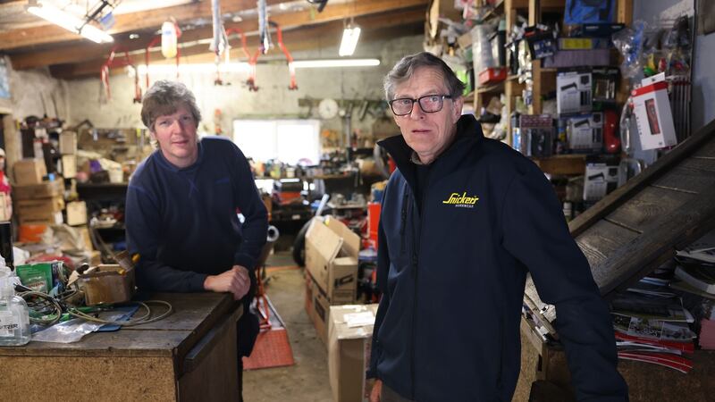 Declan Moran and his son,  Tadhg, of  Morans bike shop. Photograph: Dara Mac Dónaill