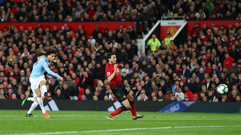Sane shoots past Darmian to put City 2-0 up. Photo: Catherine Ivill/Getty Images