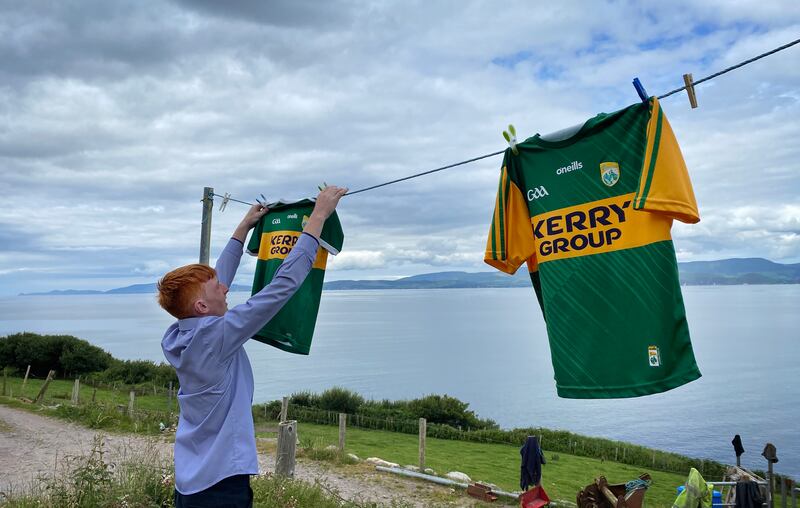 Daniel O’Sullivan (15) hangs out Kerry football jerseys at his home in Rossbeigh in Co Kerry before the All-Ireland final against Galway which Kerry won on July 24th. Photogrph: Bryan O Brien/The Irish Times