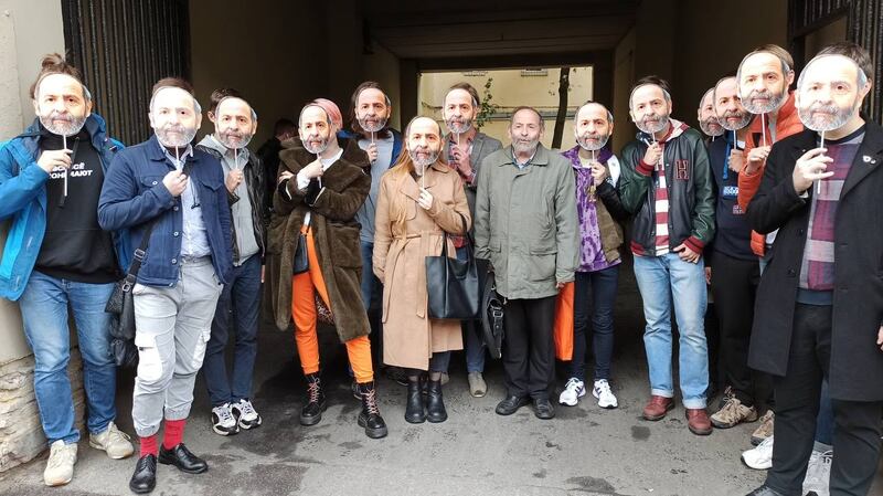 Supporters of Boris Vishnevsky (centre, without mask) wear masks to mock two rivals who altered their names and appearance to resemble his before recent elections. Photograph: Courtesy of Boris Vishnevsky