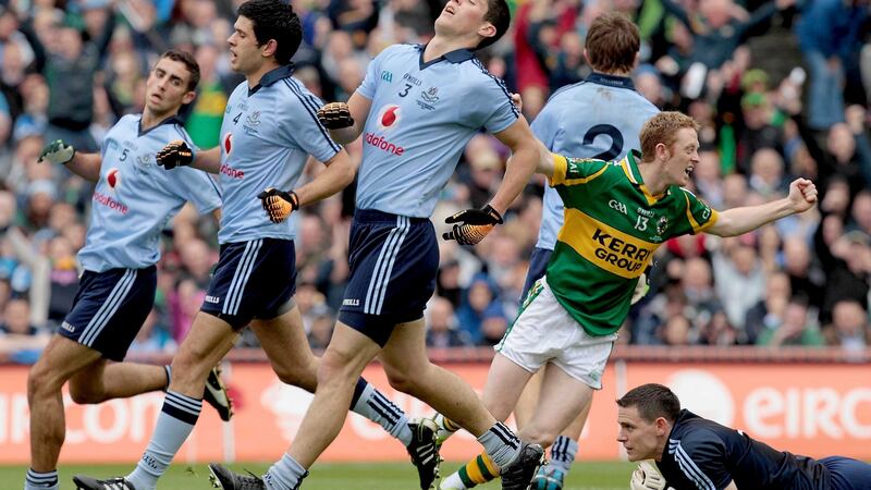 Colm Cooper turns to celebrate his goal against Dublin in the 2011 All-Ireland final. Photograph: Morgan Treacy/Inpho