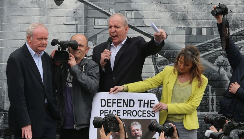 Sinn Féin’s Martin McGuinness and Bobby Storey address supporters at a protest on the Falls Road over the arrest of Gerry Adams in 2014. File photograph: Niall Carson/PA