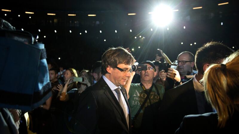 Catalan president Carles Puigdemont arrives to an event marking the start of campaigning for the independence ballot in Tarragona  on  Thursday night. Photograph:  Emilio Morenatti/AP