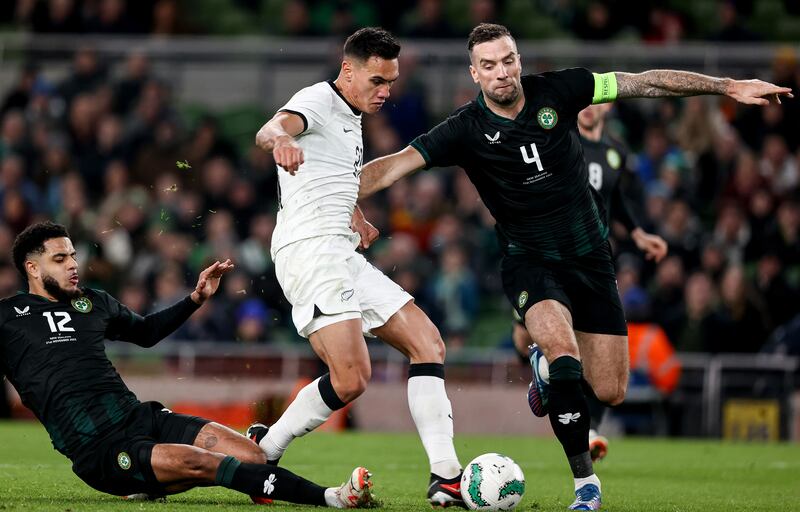 New Zealand's Max Mata with Andrew Omobamidele and Shane Duffy of Ireland. Photograph: Ben Brady/Inpho