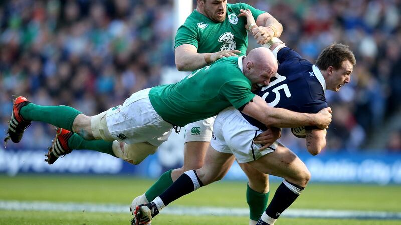 Paul O’Connell and Cian Healy tackle Scotland’s Stuart Hogg during the 2015 Six Nations game at Murrayfield. Photograph: Dan Sheridan/Inpho