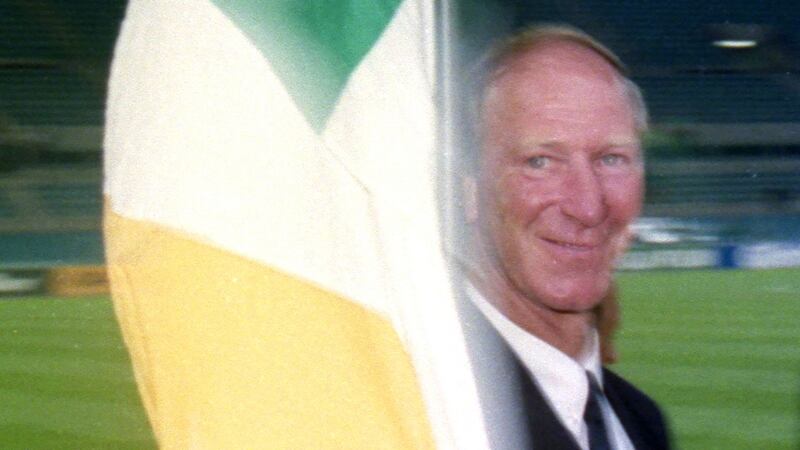 Jack Charlton with an Ireland flag after the quarter-final loss to Italy. Photo: Billy Stickland/Inpho