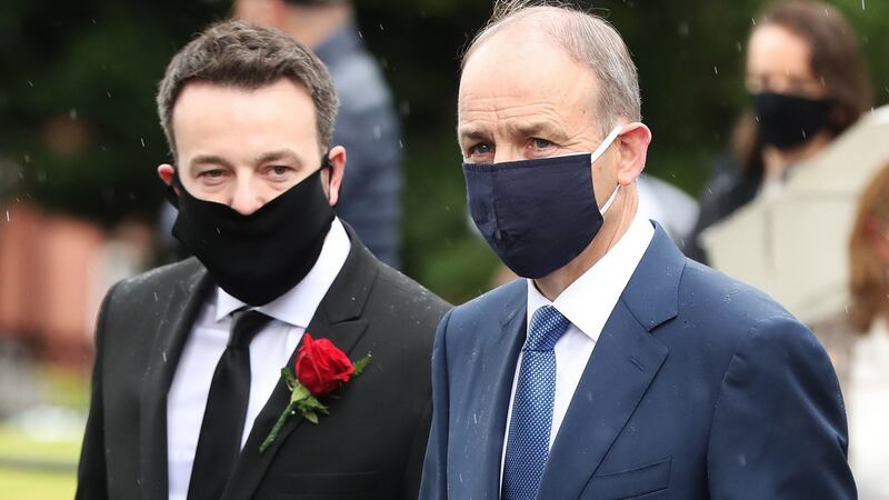 Taoiseach Micheál Martin (right) alongside SDLP leader Colum Eastwood. Photograph: Niall Carson/PA Wire