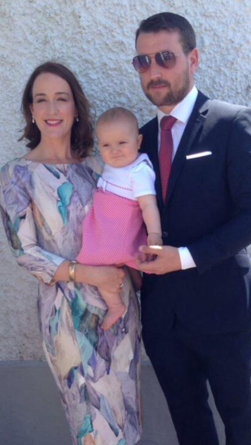 Shane Kelly with his wife Ciara and daughter Róise:  “At first the only issue was the cost of travel – now it’s the time I miss out with them.”