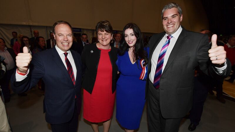 The DUP’s Nigel Dodds, left, with Arlene Foster,  Emma Little Pengelly and  Gavin Robinson, won 21,240 votes compared with John Finucane’s 19,159. Photograph:   Charles McQuillan/Getty Images